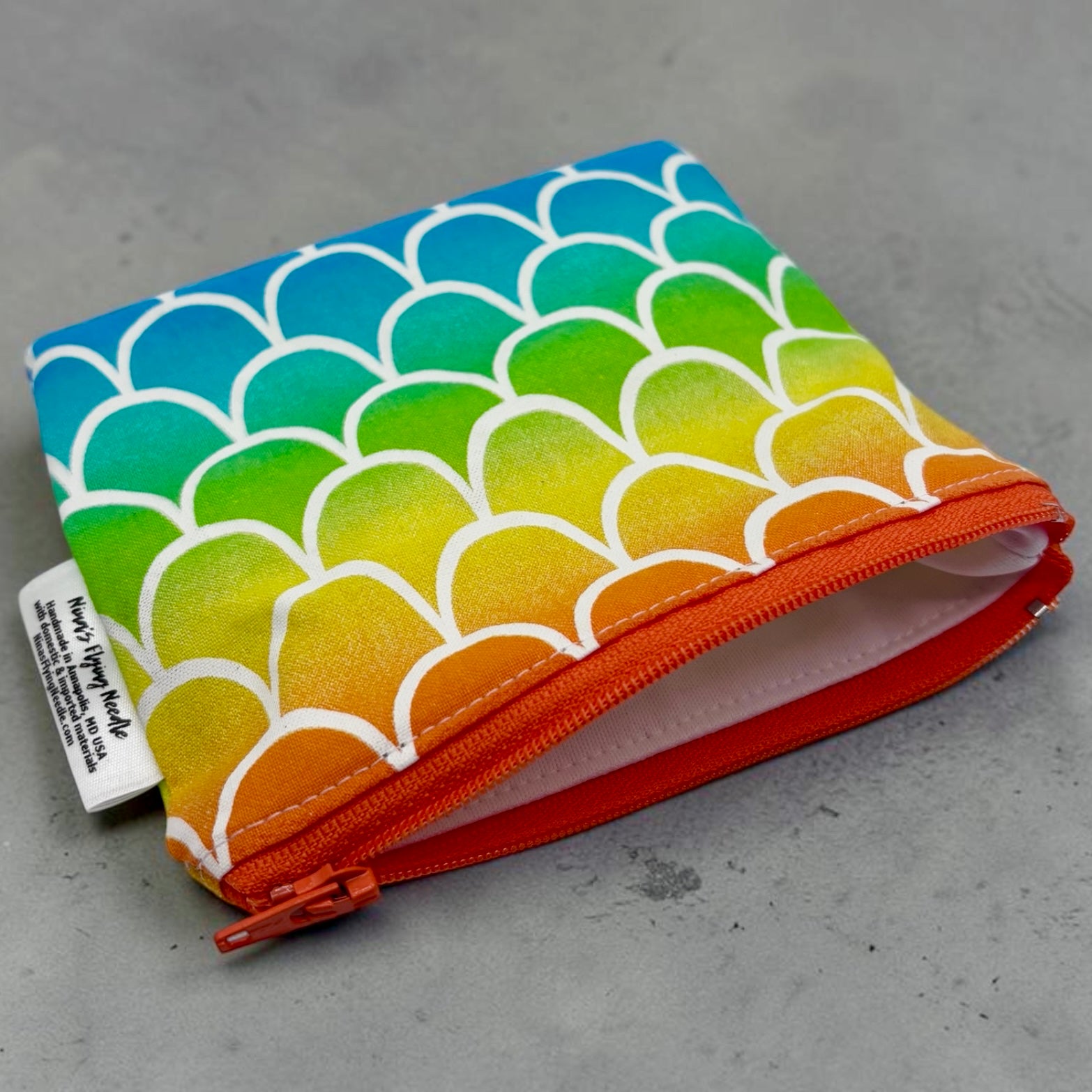 Toddler Sized Reusable Zippered Bag Scales Bright Orange and Blues