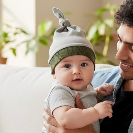 Knot Hat in Newborn: Solid Gray with Leaves